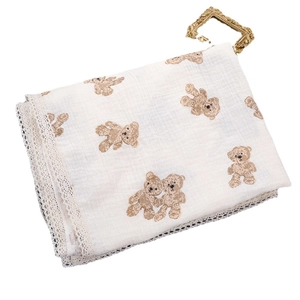 Breathable muslin baby swaddle blanket with bear print and delicate lace trim edges