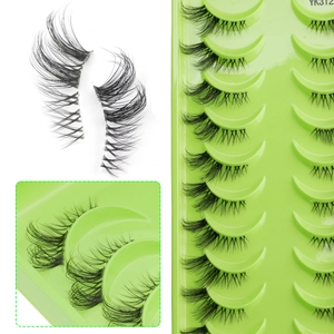 Close-up of black half-eyelashes YK312 neatly arranged in a green plastic tray