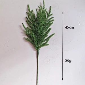 Detail showing 45cm artificial Norfolk pine branch with realistic soft needles and weight