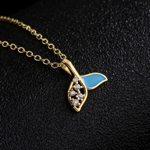 Gold-plated 18K fishtail pendant necklace with blue enamel and clear zircon stones