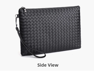Detail view of woven black leather men's clutch with wristlet and metal zipper