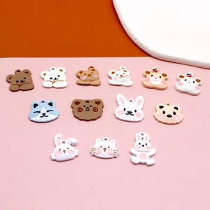 Detailed view of matte resin cartoon animal charms for DIY earrings and hair jewelry