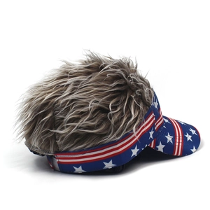 Macro view showing the texture of grey synthetic hair attached to stars and stripes cap