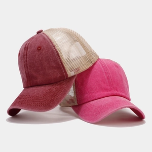 Retro mesh trucker caps in burgundy and pink with washed cotton and breathable fabric