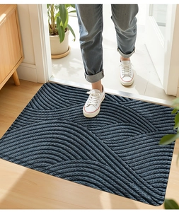 Detail der dunkelblauen PVC-Türmatte mit Wellenstruktur und rutschfester Oberfläche