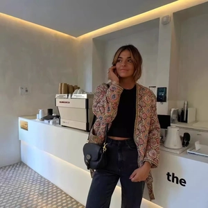 Bohemian printed cotton jacket with matching belt for women in a stylish cafe setting
