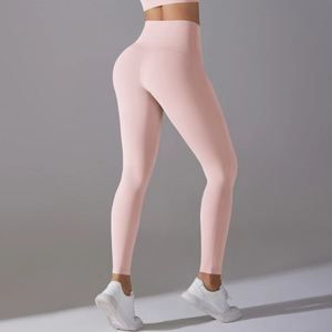Detailed back view of light pink high-waisted yoga leggings showing bum-lifting silhouette