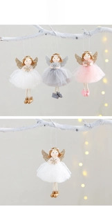 Detailed view of handmade angel ornaments with mesh skirts and sequin wings for Xmas trees