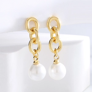 Elegant gold brass drop earrings with triple interlocking rings and a white pearl drop