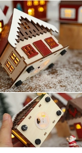 Detail of Christmas wooden house bottom with LED switch and battery compartment