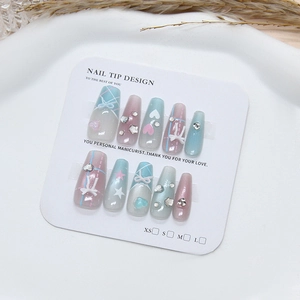 Handmade gradient press-on nails with 3D bows, hearts, and stars in long coffin shape