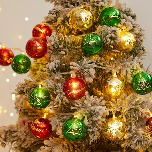 Glowing Christmas ball string lights with snowflake and tree patterns for tree decor
