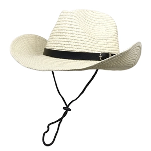 Detail of western straw hat featuring a slim faux leather belt and adjustable chin strap