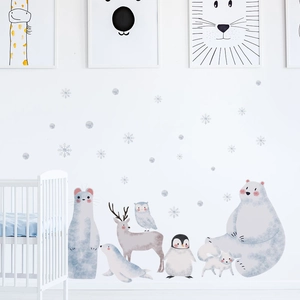 Watercolor arctic animal wall stickers featuring polar bears and penguins in a nursery