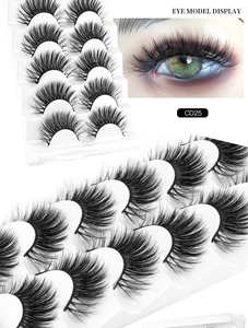 Macro view of 8D faux mink eyelashes style CD25 on a model and in packaging