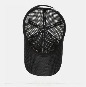 Close-up of the breathable mesh lining and NY&JA logo tape inside this black baseball cap
