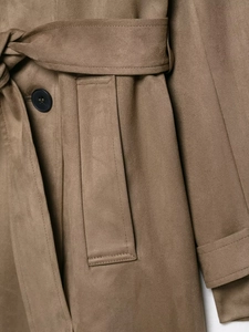 Macro detail of camel faux suede trench coat fabric with belt tie and stitching