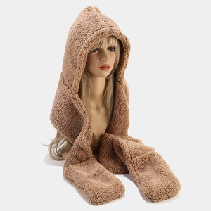 Close-up of three-in-one brown sherpa fleece hooded scarf with integrated mittens for winter
