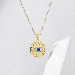 Detailed close-up of golden evil eye disc necklace with micro-inlaid colored zircons