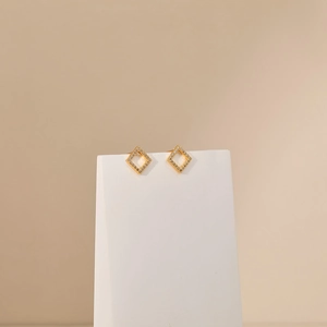 Detailed macro view of 18K gold plated hollow square stud earrings with micro-inlaid zircon