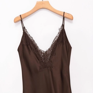 Brown satin camisole dress with lace trim hanging on a wooden hanger with silk finish