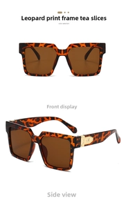 Detail of tortoise square sunglasses with brown lenses and golden M logo on temples