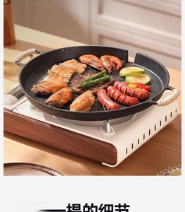 Detail of round maifan stone grill pan with oil drain and hemp rope insulated handles