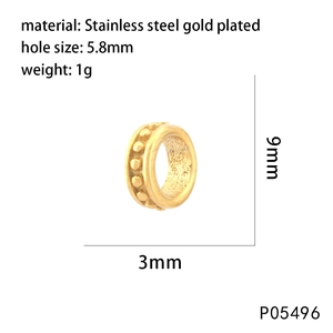 Macro shot of 5.8mm hole gold plated stainless steel bead with P05496 model marking