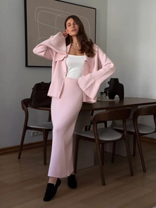 Chic light pink V-neck knit cardigan with trumpet sleeves and matching maxi skirt set