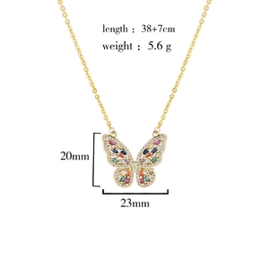 Detail view of 18K gold plated butterfly pendant with dimensions 20mm x 23mm and length