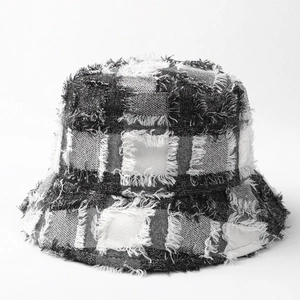 Fashionable black and white checkered tweed bucket hat with frayed edges for women