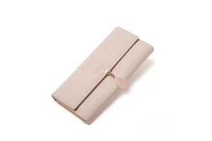 Detail view of pink PU leather wallet with metallic leaf pendant and snap closure