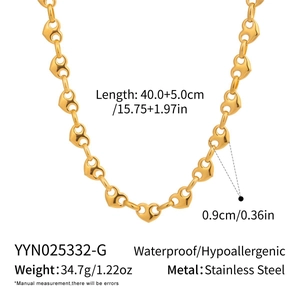 Detail showing dimensions and 34.7g weight of gold stainless steel heart chain necklace