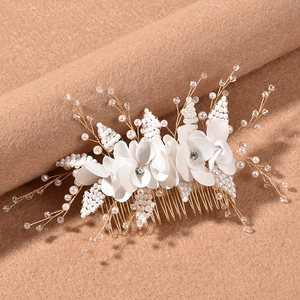 Elegant bridal hair comb with white silk flowers, faux pearls, and rhinestones