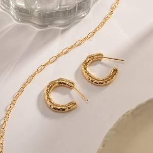 Elegant 18K gold plated stainless steel C-shape earrings with a textured hammered finish