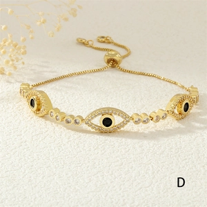 Detail view of 18K gold-plated Evil Eye bracelet with zircon and adjustable pull-cord