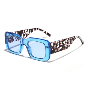 Oversized retro square sunglasses with translucent blue frames and tortoiseshell temples