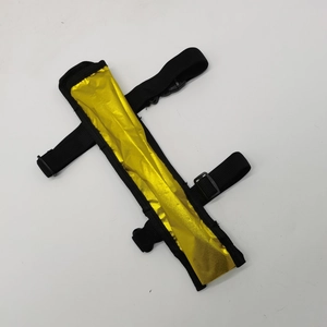 Detail of a 33cm gold reflective Kung Fu fan featuring black webbing and a plastic buckle