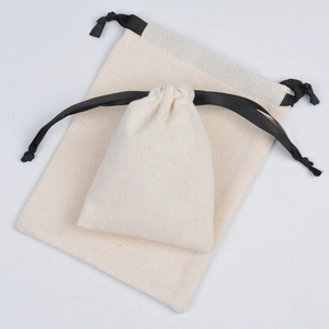 Natural beige cotton drawstring jewelry bags in two sizes for gift packaging