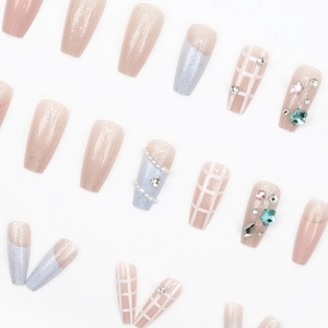 Pink and blue ballerina press-on nails with glitter, pearls and checkerboard patterns