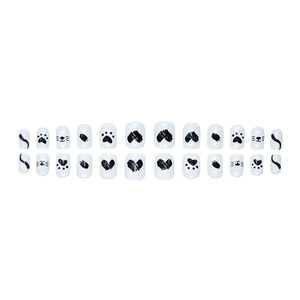 Short square press-on nails with cute black and white cat paw prints and cat face patterns