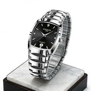 Detailed side view of silver steel men's square watch on a marble display stand