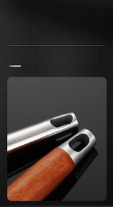Detail of 304 stainless steel and wood handles with large hanging holes for easy storage