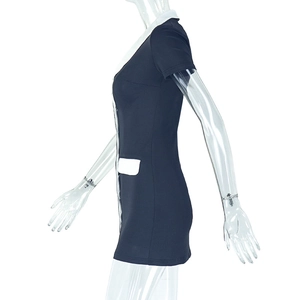 Detailed side view of slim fit contrast lapel dress on a mannequin with button accents