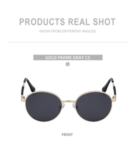 Front view of retro round sunglasses featuring a gold metal frame and dark gray lenses