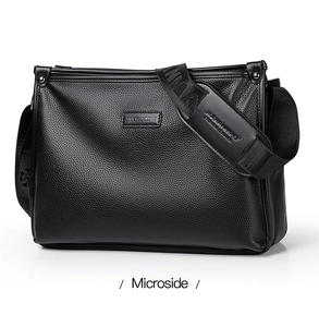 Microside view showing the lychee pattern leather texture of the black shoulder bag