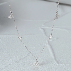 Detailed close-up of S925 silver butterfly necklace with sparkling zircon stones
