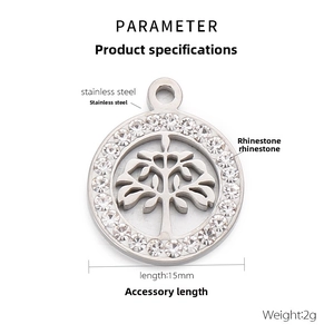Detail of 15mm stainless steel tree of life pendant with sparkling cubic zirconia inlay