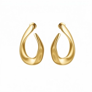 Exaggerated golden irregular teardrop hoop earrings with polished metallic luster design