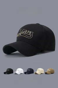 Detail of embroidered 'REALIZE max' text on premium cotton twill baseball cap